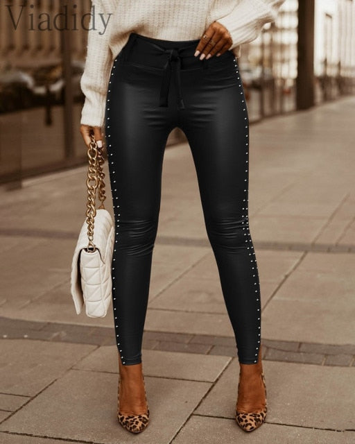 Sexy Studded Design High Waist Lace-up Skinny Pants